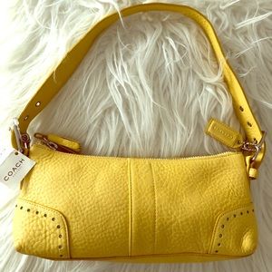 COACH authentic small yellow hand bag. NWT